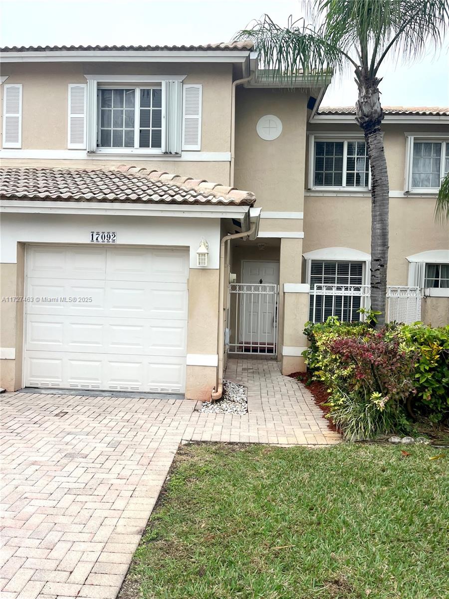 Beautiful townhome in a desirable community in Pembroke Pines. 24 hour guard gate, 3 pools, tennis & racquetball courts & more. Located near major highways & shopping centers. Accordion Shutters!, Stainless SteelS Kitchen Appliances, Washer and Dryer, Beautiful Crown molding. Tumble Marble Flooring/Carbonized Strand Woven Bamboo Flooring, Up Graded Kitchen Cabinets w/ Beautiful Granite Counter top. Great Floor Plan w/ half bathroom downstairs for guest. Enjoy resort-style living! Opportunity will not last!