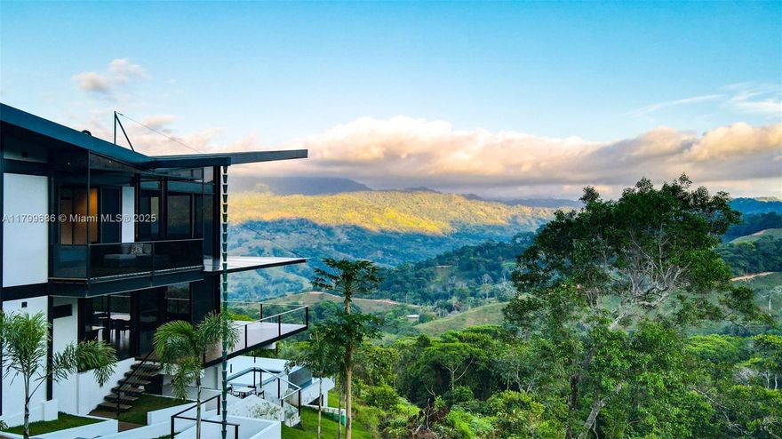 Escape to a world of peaceful serenity with this unique Costa Rican property nestled in the upscale community of Escaleras. This modern, multi-level home blends contemporary architecture with the natural surroundings, creating a private oasis that is ideal for luxury living and boutique rental opportunities. The four-level structure is thoughtfully designed into the hillside, featuring expansive three-sided glass walls, a glass-roofed carport, and a party-sized pool deck that takes advantage of the incredible views. With a design that blends industrial style and natural warmth, this home is true architectural gem. Inside, wood finishes, granite countertops, and stone, wood, and bamboo inlays create a sense of refined elegance. Situated just 10 mins from the beaches of Dominical.