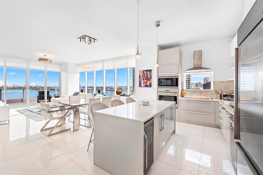 Upgraded 3-bedroom, 3-bathroom corner unit nestled in Paramount Bay, boasting unparalleled unobstructed water views. This residence offers natural light streaming through floor-to-ceiling windows. The unit features a spacious layout with modern finishes, an open-concept kitchen equipped with top-of-the-line appliances, and all en-suite bathrooms. Residents indulge in resort-style amenities including a bayfront pool, state-of-the-art fitness center, and concierge services. Prime location in the heart of Miami's Edgewater ensures effortless access to vibrant dining, shopping, and entertainment options, complemented by the nearby scenic Margaret Pace Park and close to Miami Beach and Downtown.