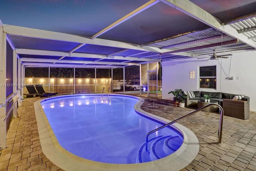 Discover the charm of Hollywood in this elegant and spacious home, just 5 minutes from the boardwalk and beach. Enjoy a wealth of modern conveniences and amenities including a fully equipped kitchen, expansive living area, and 4 bedrooms. The pool area and game room offer additional spaces for relaxation and entertainment.

Contemporary furnishings and tasteful artwork complement the luxurious bright floors and abundant natural light streaming through spacious windows, creating a stunning ambiance you'll be proud to call home. Whether moving freely through the open living spaces, unwinding in the private pool area with lounges, enjoying hours of entertainment in the game room, or retreating to one of the comfortable bedrooms, every corner of this home invites comfort and enjoyment.