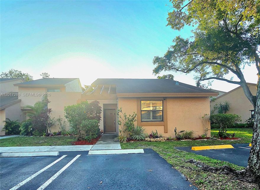 Upgraded 2-bedroom, 2-bath corner villa featuring enhanced privacy and natural light. This move-in-ready home includes a modern kitchen, updated bathrooms, tile flooring, and an open layout. The corner unit offers extra outdoor space, spacious bedrooms, and a relaxing patio. Conveniently located near shopping, dining, and highways, it perfectly combines comfort and style.  Rock Creek master fees are $200.00 quarterly including all the amenities.