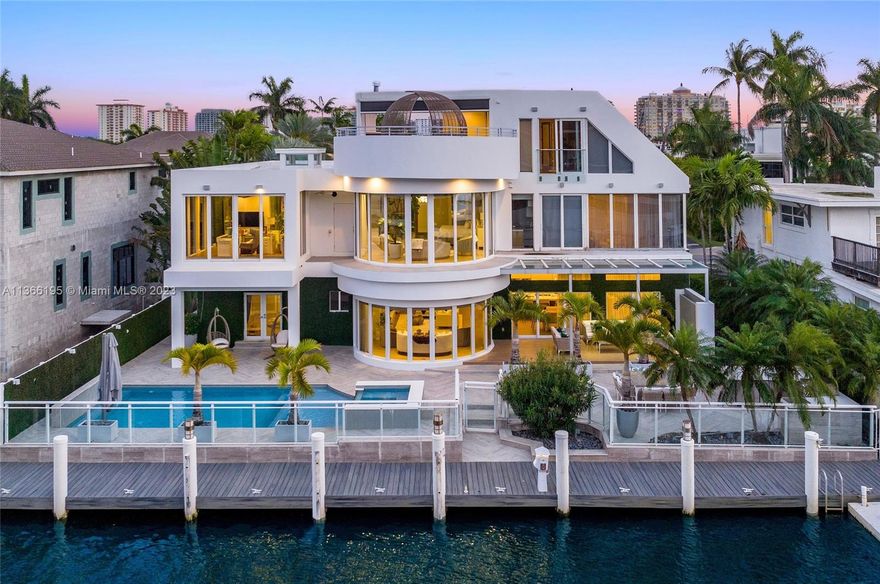 This contemporary modern masterpiece, completely remodeled in 2015, will surely take your breath away! Featuring 7 bd, and 8.5 ba this tropical oasis also sits on 90 ft of waterfront. Water views set the scene from the primary bedroom, rooftop patio and lush backyard. As you enter, this three-level home features floor to ceiling windows, open floor plan, impact windows, top of the line appliances, Lutron lighting, Somfy shades, high end security systems and more. True vacation style of living, enjoy private rooftop terrace, outdoor summer kitchen and resort style backyard with private dock. Take workouts from primary bedroom overlooking the crisp waters of Intracoastal. Situated in one of the best areas of Fort Lauderdale, this is a pristine opportunity to live life the absolute fullest.