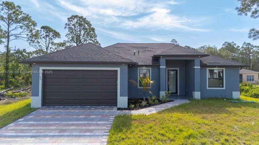BIG SELLER CONTRIBUTION FOR BUYER'S CLOSING COST. This beautiful property, built in 2024, is located in a central area of the Lehigh Acres. Located very close to the Mayor Highway 82. Built on a 0.25 acre lot, with luxurious finishes. Enjoy a completely porcelain floor and modern kitchen and bathroom cabinets. It also has a double garage spaces and a beautiful driveway with modern pavers. Strategic location for parking truck.