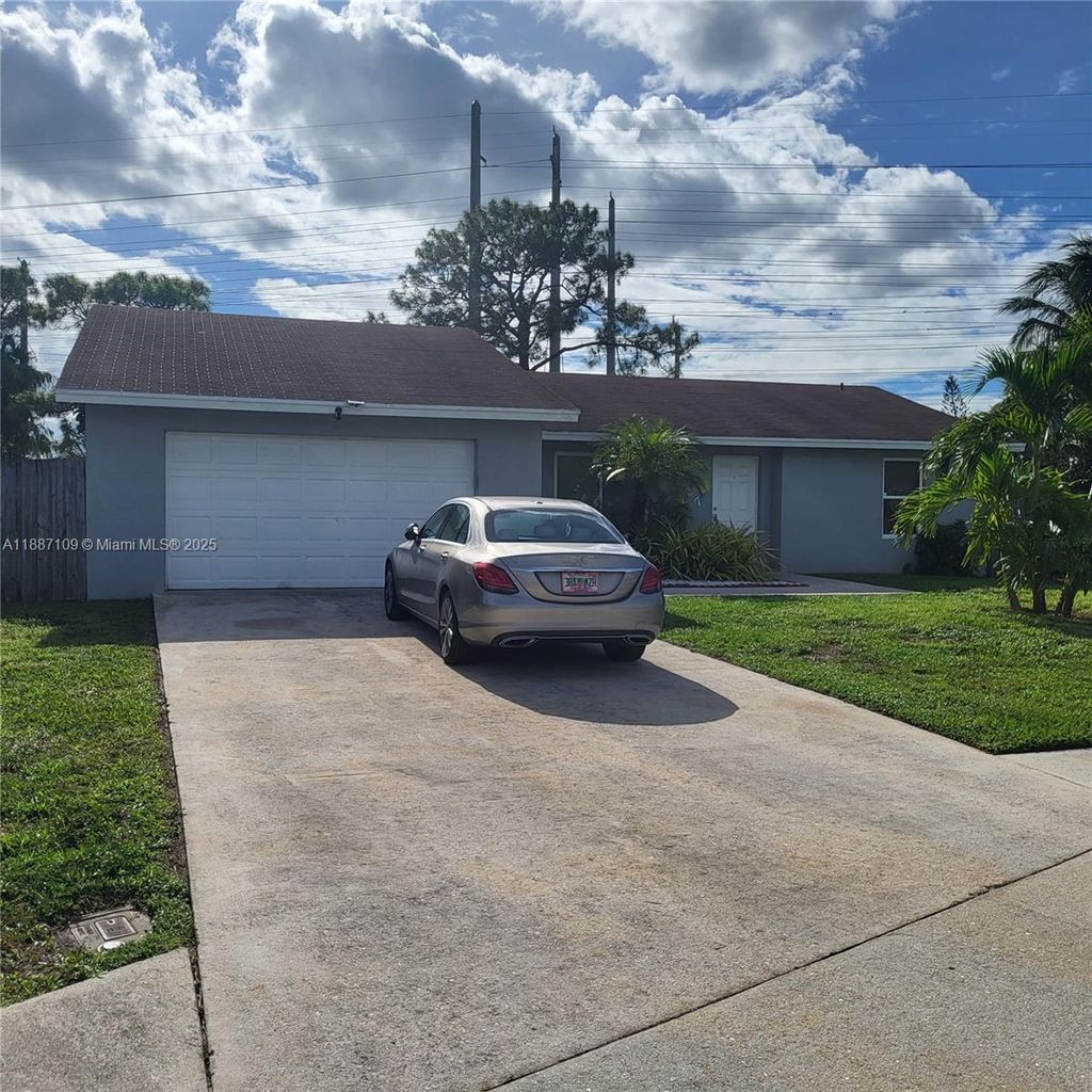 Photo of 127 Seagull Ct, Royal Palm Beach, FL 33411 (MLS # A11887109)