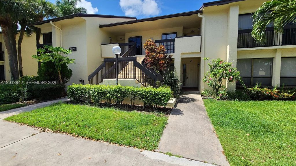 Photo of 1929 SW 15th St #41, Deerfield Beach, FL 33442 (MLS # A12013942)