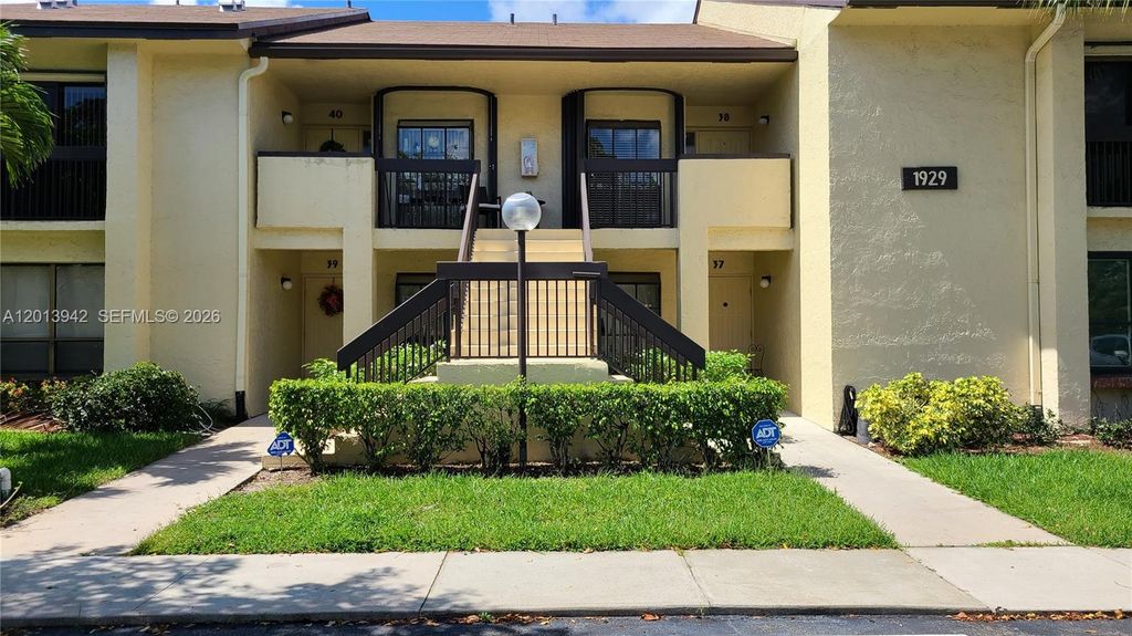 Photo of 1929 SW 15th St #41, Deerfield Beach, FL 33442 (MLS # A12013942)