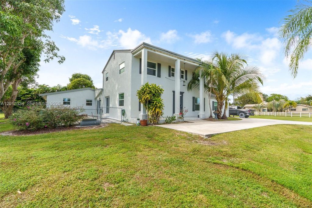 Photo of 7601 NW 82nd Ter, Parkland, FL 33067 (MLS # A12015334)