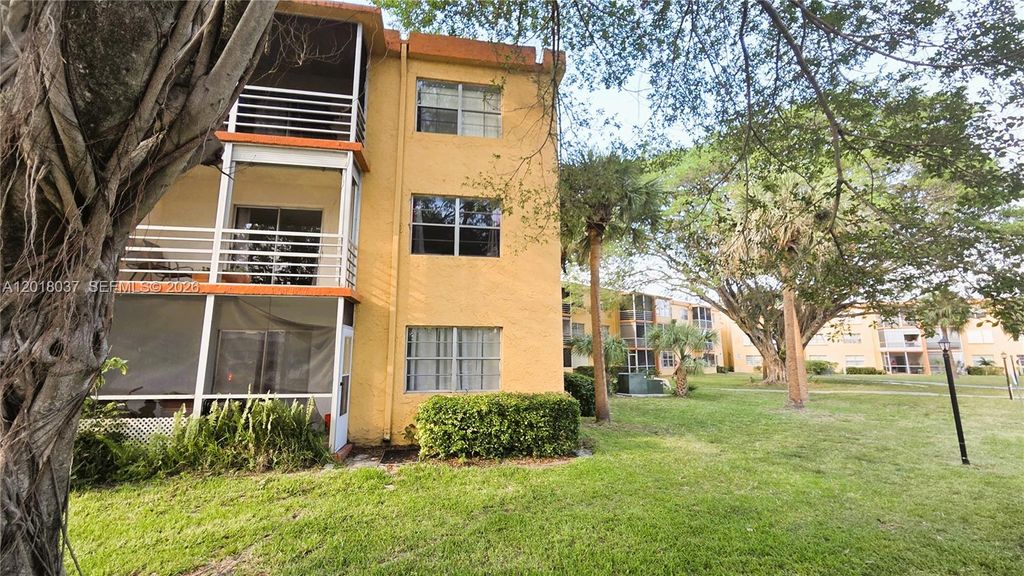 Photo of 4344 NW 9th Ave #10-2B, Deerfield Beach, FL 33064 (MLS # A12018037)