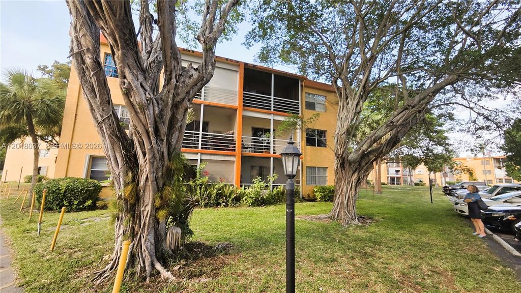 Photo of 4344 NW 9th Ave #10-2B, Deerfield Beach, FL 33064 (MLS # A12018037)