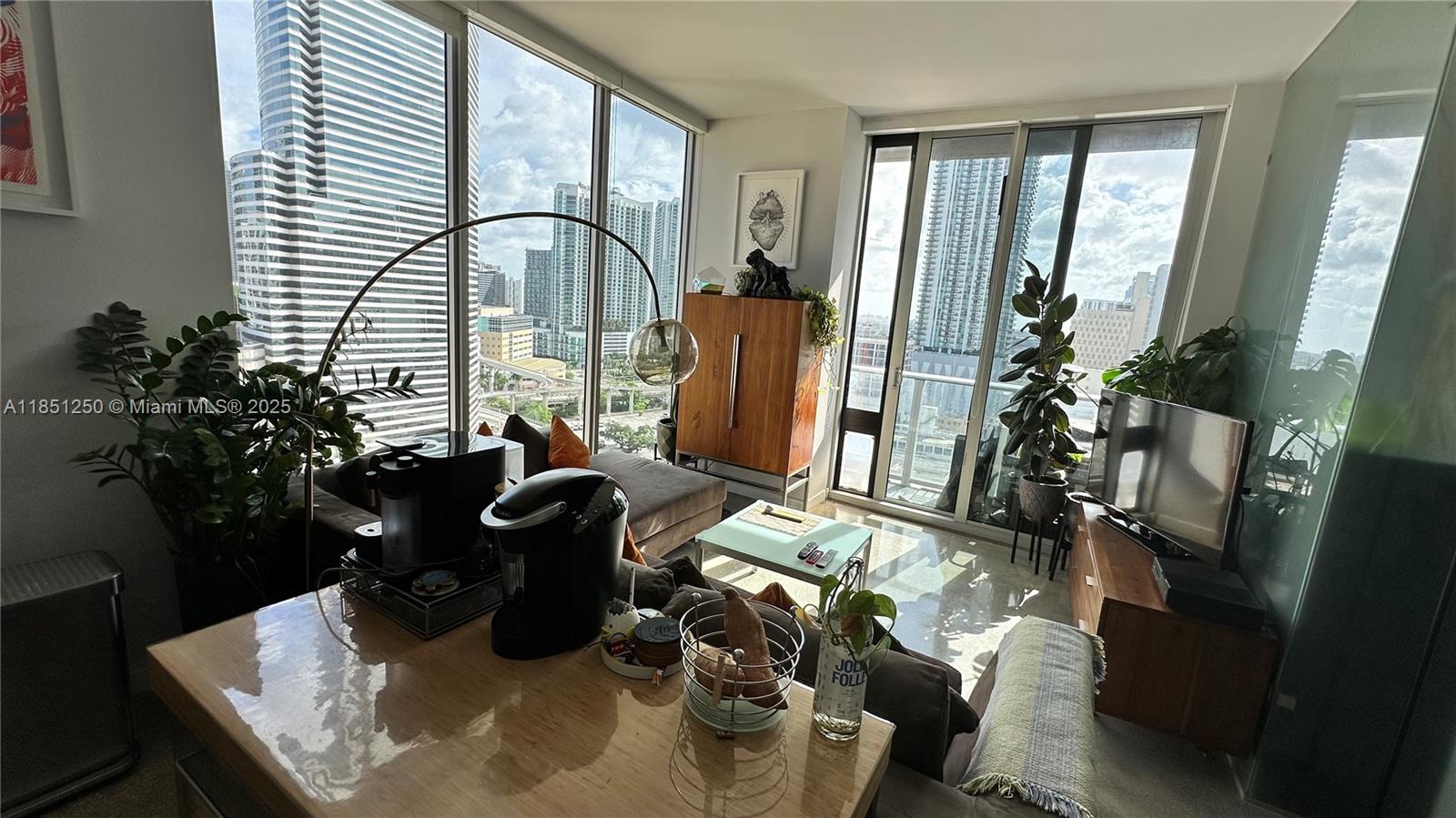 Spacious and modern corner 2BD/2BA unit at CENTRO in the heart of Downtown Miami. Enjoy stunning panoramic views of the skyline facing south and west through floor-to-ceiling windows. Features include an open kitchen with quartz countertops and stainless steel appliances, split-bedroom layout with large closets, and sleek contemporary finishes. Building offers 24/7 front desk, valet, fitness center, sauna, steam room, game lounge, and a rooftop pool with breathtaking views. Walk to Brickell, Bayside, the MetroMover, restaurants, and shops. Please note: no parking space included.