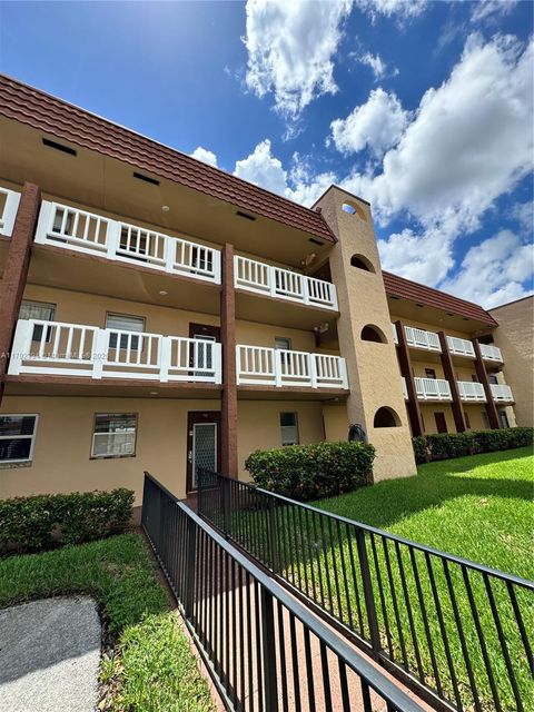 Photo of 9041 Sunrise Lakes Blvd #110, Sunrise, FL 33322 (MLS # A11792994)