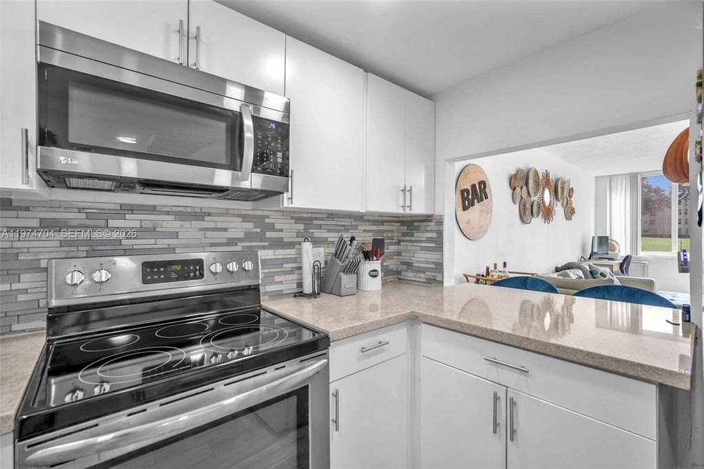 Photo of 9431 Live Oak Pl #108, Davie, FL 33324 (MLS # A11974704)