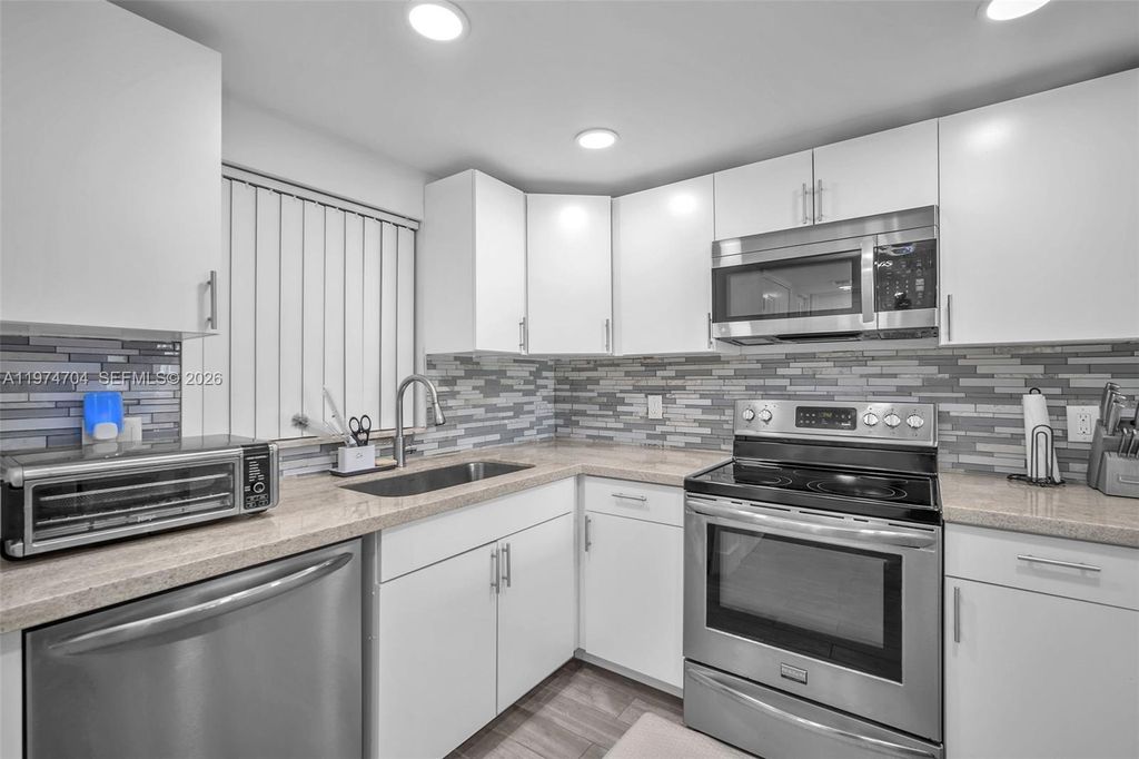 Photo of 9431 Live Oak Pl #108, Davie, FL 33324 (MLS # A11974704)