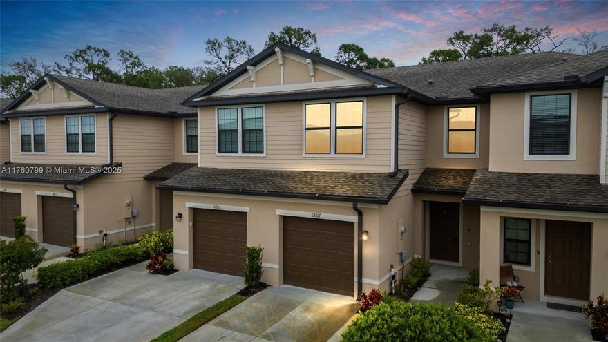 Experience modern living in this stylish 3-bedroom, 2.5-bath townhome with a 1-car garage in the sought-after Portico community. The open floor plan features a contemporary kitchen with quartz countertops, stainless steel appliances, and a breakfast bar, seamlessly connecting to the dining and living areas. The primary suite boasts two walk-in closets and an en-suite bath with dual sinks and a walk-in shower. Enjoy serene preserve views, tile and carpet flooring, and elegant lighting throughout. Portico offers resort-style amenities, including a pool, fitness center, tennis, pickleball, and basketball courts. Conveniently located near shopping, dining, and major roadways, this home is a must-see!