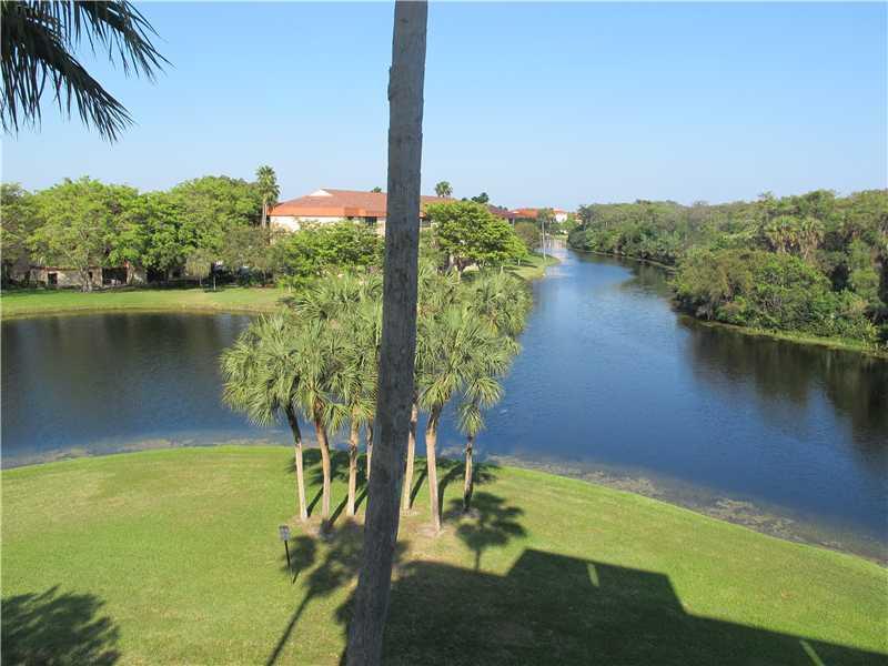 SPOTLESS 4TH FLOOR CONDO IN ELEVATOR BLDG OVERLOOKING WINDING LAKE AND TRADEWINDS PARK WILDLIFE PRESERVE ENJOY THE TRANQUIL VIEWS FROM THIS LIGHT AND BRIGHT 2 BEDROOM / 2 BATHROOM UNIT! NATURAL LIGHT ABOUNDS IN THIS SPACIOUS TOP FLOOR UNIT CONTAINING 2 LA RGE BEDROOMS WITH WALK IN CLOSETS, KITCHEN WITH EAT IN AREA. ENJOY ALL THIS COMMUNITY HAS TO OFFER INCLUDING POOL, FITNESS CENTER, THEATER, TENNIS, WALKING/JOGGING PATHS, CLUBHOUSE, SECURED BUILDINGS, SHIMMERING LAKES AND MUCH MORE-NO RENT RESTRICTION-