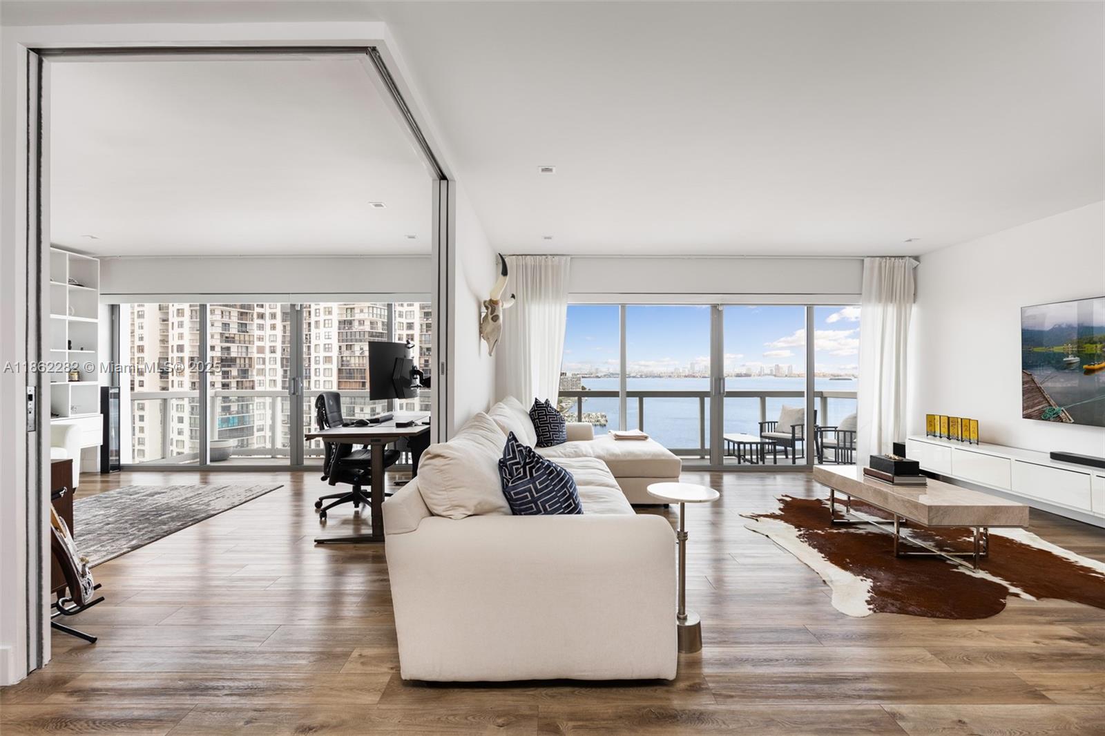 Corner unit with the best views in the building, this fully renovated 3-bedroom residence offers expansive and unique open-concept living with two primary suites and a split floor plan. Enjoy seamless indoor/outdoor flow to a large balcony overlooking the open bay. Completed with permits, updates include new plumbing, electrical, new appliances including induction stovetop and convection oven plus a full-size washer/dryer. The building is well-maintained and well-managed with reserves and no current assessments. Building offers top-tier amenities: heated pool, two jacuzzis, gym, mini market, tennis courts, kids playroom, BBQ area, valet, and more. One parking space included. Guard-gated entry for added privacy. South Brickell prime location to Coconut Grove, Brickell, MIA and Key Biscayne