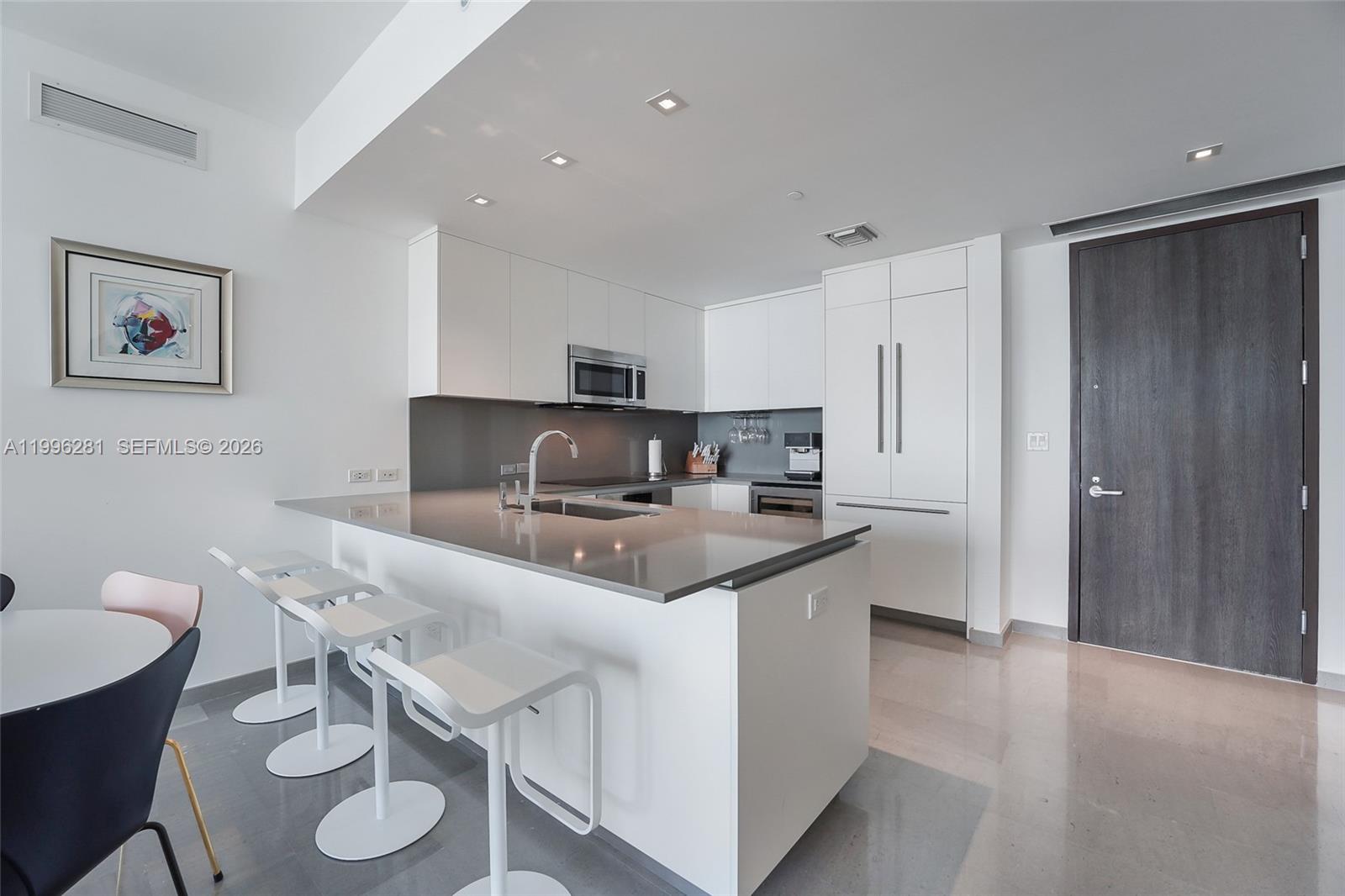 REACH CONDO - Residential Lease