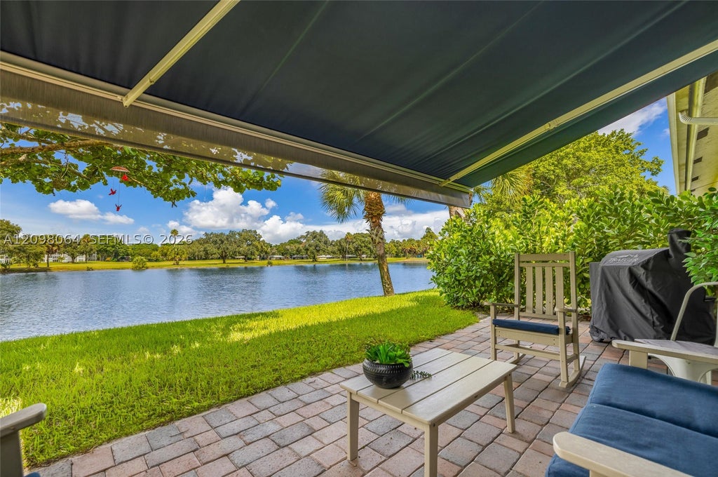 Photo of 4107 Carriage Dr #K1, Pompano Beach, FL 33069 (MLS # A12098064)
