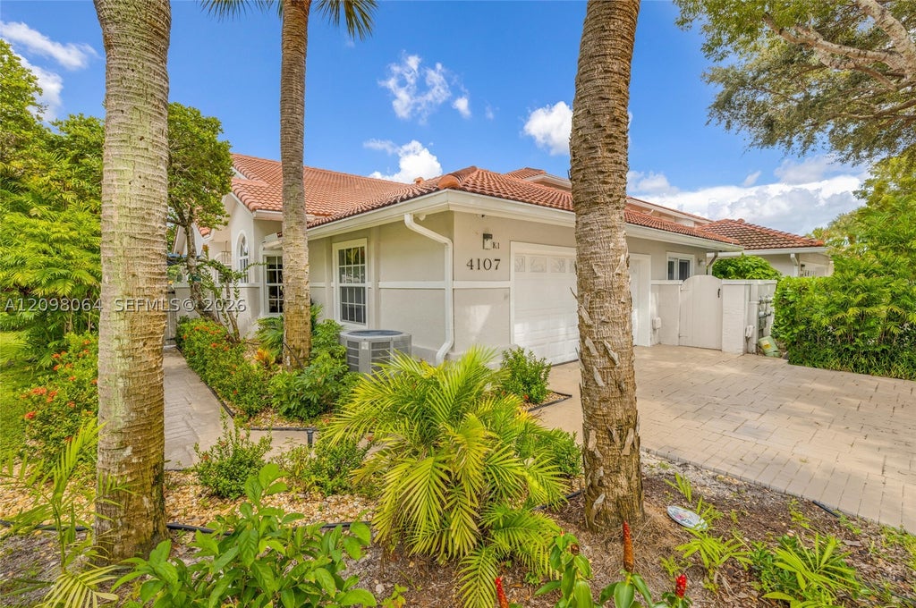 Photo of 4107 Carriage Dr #K1, Pompano Beach, FL 33069 (MLS # A12098064)