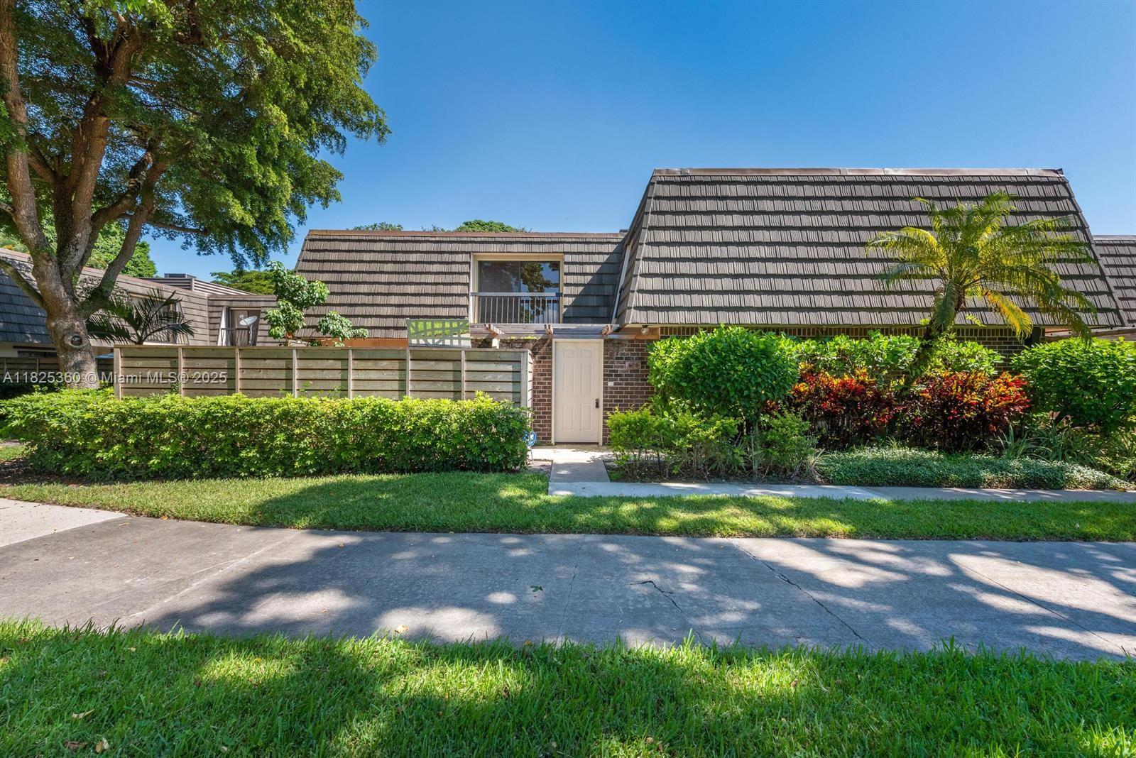 This Glenwood townhome offers 2 bedrooms and 3 full bathrooms with water views including its very own private fenced in patio area! A Brand-new fence and trellis were just completed. Large great room with updated kitchen and baths that include granite counter tops plus, an eat in bar with serving pass through window to the patio. Both bedrooms have their own balcony with lake and fountain views. Glenwood Townhomes amenities include racquetball court, pickle ball court, tennis courts, swimming pool and park. The community has access to its own trails, located through the development to give the residents the opportunity to enjoy the outdoors. The community is conveniently located to the club, golf courses, spa, shopping centers, restaurants, and entertainment!