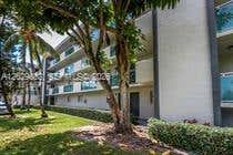 Photo of 8445 Springtree Dr #409A, Sunrise, FL 33351 (MLS # A12029082)