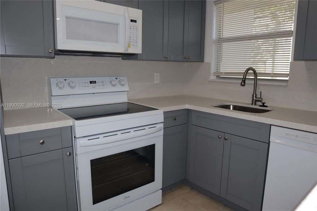 Photo of 8500 Sunrise Lakes Blvd #111, Sunrise, FL 33322 (MLS # A11990032)