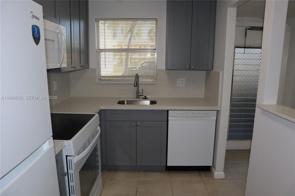 Photo of 8500 Sunrise Lakes Blvd #111, Sunrise, FL 33322 (MLS # A11990032)