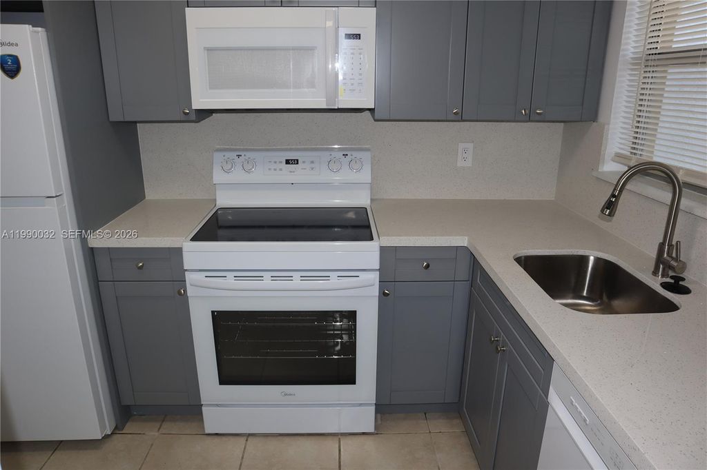 Photo of 8500 Sunrise Lakes Blvd #111, Sunrise, FL 33322 (MLS # A11990032)