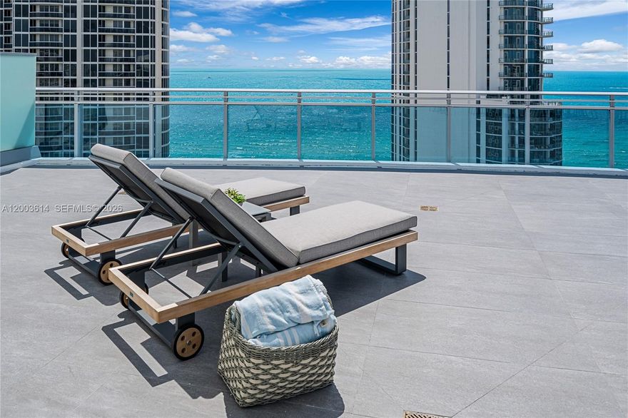 BEAUTIFUL PENTHOUSE IN AN OCEANFRONT EXCLUSIVE BOUTIQUE BUILDING WITH ONLY 63 RESIDENCES IN SUNNY ISLES.  SPACIOUS 3 BEDROOMS/3.5 BATHS PROFESSIONALLY DECORATED WITH HIGH-END FURNITURE. PROPERTY FEATURES 10" HIGH CEILINGS, HURRICANE IMPACT FLOOR-TO-CEILING WINDOWS, PRIVATE TERRACES W/PANORAMIC VIEWS OF THE OCEAN & THE CITY, BIG HIS/HERS BUILT-IN CLOSET, SHOWER & FREE STANDING TUB IN MASTER BEDROOM.  HIGH-END APPLIANCES, INCLUDING SUB-ZERO FRIDGE AND KITCHEN CABINETS FROM ITALKITCHEN. SPECTACULAR HUGE 2700 SF ROOF TOP TERRACE W/OUTDOOR KITCHEN FOR OUTDOOR ENTERTAINMENT.