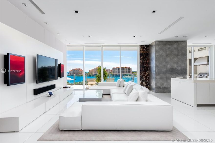 Live in one of Miami’s most exclusive and luxurious destinations, the Apogee. South of Fifth’s premier boutique building, this waterfront smart home in the sky boasts 3,104 square feet of elegant finishes, 11 ft deep terraces, top-of-the-line gourmet kitchen. Flow through floor plan of 3 bedrooms, 3 full bathrooms and 1 half bath, a summer kitchen, private elevator entry and breathtaking views to the open bay, Fisher Island, the intracoastal and the sparkling Miami skyline. The principal suite offers a sumptuous shower with 2 showers heads and dual sinks. One of a kind amenities, elite security and ultimate privacy that only Apogee can offer.