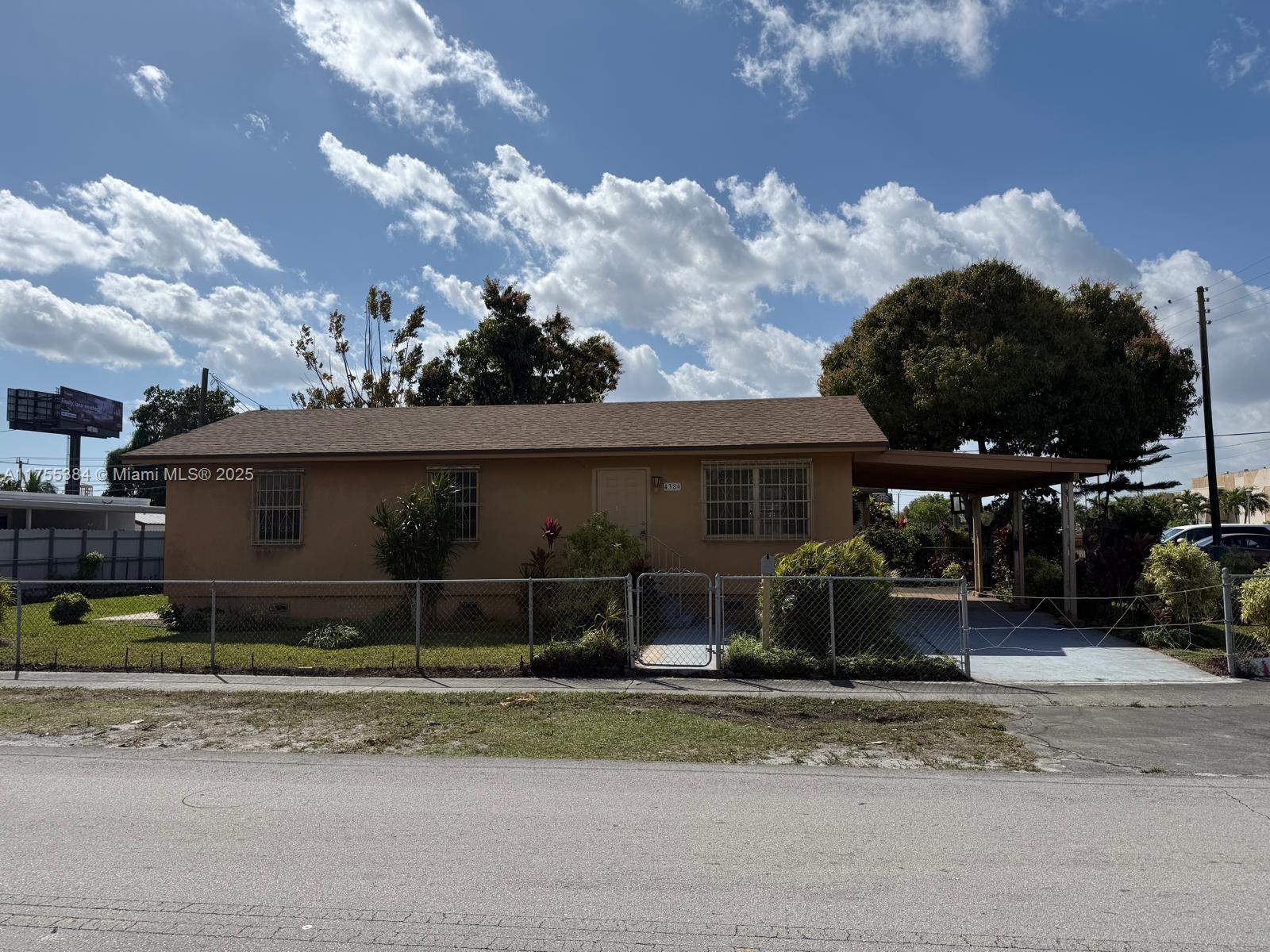 No FHA. This is a great home for a first time buyer or investor looking to add to their portfolio. Home can be financed conventional and is one of the lowest priced homes in this hot Miami Gardens area. The roof was replaced in 2022 the AC and water heater have also recently been replaced. The corner lot has large entrences on three sides and a large covered carport. Perfect lot for an RV or Boat. This home just needs some cosmetic updating and is being sold at the right price. Show and sell asap.