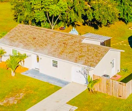 This two months to move-in Palm Bay home with fenced in yard and 360 FT utility room or to be used as garage. 3 bedrooms, 1 bathroom, living room, and awesome screened in
patio. Original garage is now a split laundry & bedroom. New refrigerator and AC, and fenced in huge yard. Plenty of room for your vehicles. Do not wait!