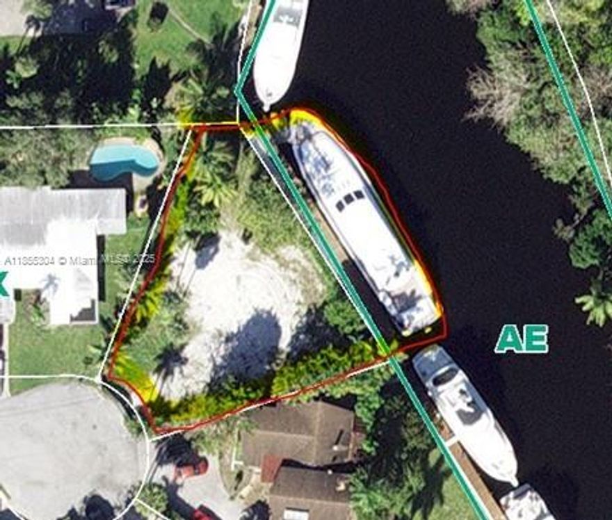ONCE-IN-A-LIFETIME OPPORTUNITY! Yacht Ready • Approved Plans • Ocean Access • Hurricane-Safe Harbor. This vacant and cleared Lot has a Newly Constructed 124-foot Concrete Seawall and composite dock , deep water. Making it easy to moor a lengthy vessel. As a highlight buyer receive fully Approved Plans to build a 5,802 sq/ft luxury home – No Delays Start Building Now! Ideal for Personal Estate or High-End Investment Property! Waterfront land like this is extremely limited and rare, with soaring demand for deep water ocean access, a reasonable seller, and virtually no new lots that can accommodate large yachts, this opportunity is truly irreplaceable. This is more than just land. It’s your gateway to World-class Yachting or the opportunity
of a timeless investment.