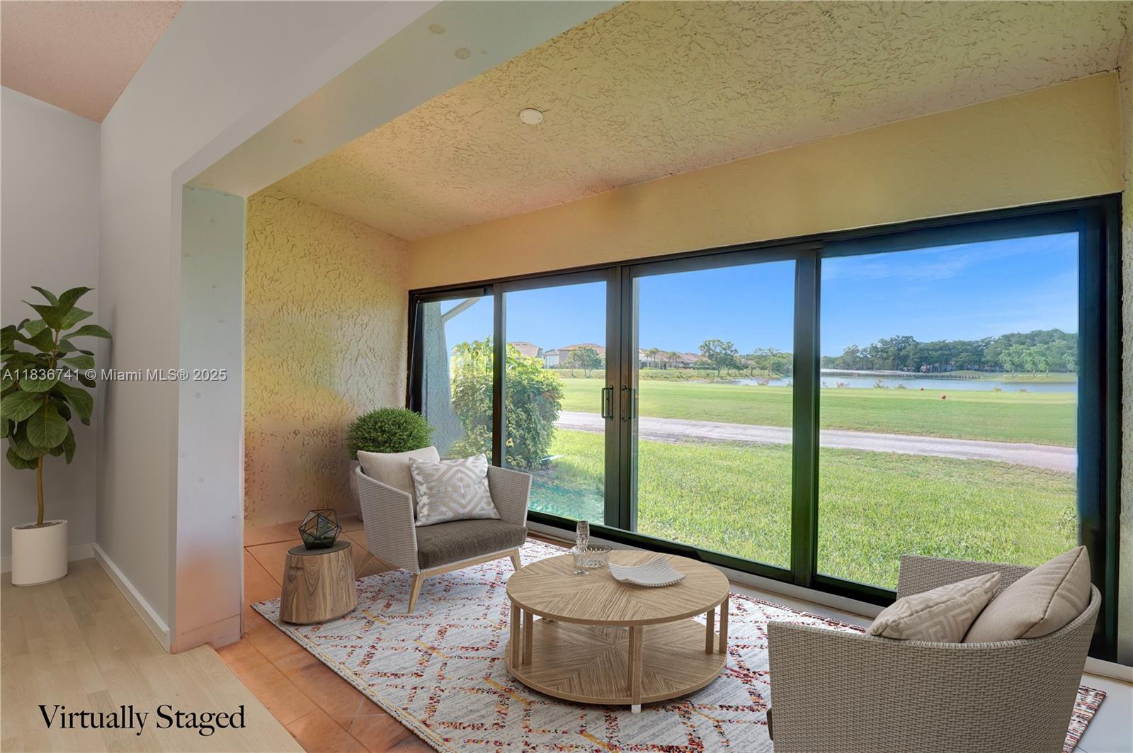 Welcome home to this bright & inviting 2-bed, 2-bath townhome in Waterford Isle at Woodmont Country Club. Enjoy the beautiful and peaceful golf course & lake views from your enclosed Florida sunroom & bedroom. With 1,318 sf of light-filled, open living space, the one-story unit features soaring skylights, spacious eat-in kitchen, wood cabinets and granite countertops. The primary suite has a custom walk-in closet while both bedrooms have ensuite bathrooms. Updates include a 2024 roof, impact doors & windows, 3-year-old AC & copper piping with a 2-car garage. 2 PETS permitted. The community pool is a short distance. This move-in ready home blends comfort, convenience, and peace of mind in a well-established neighborhood. Seller will OFFER a Closing Credit or Buy Down. Could be FHA Approved.