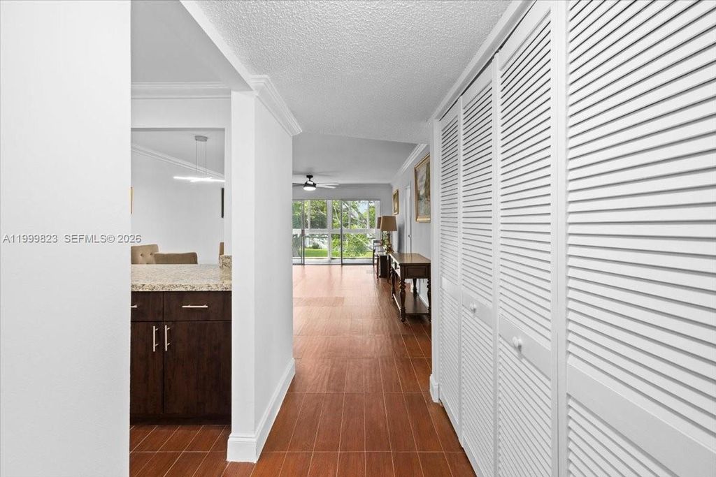 Photo of 8350 Sands Point Blvd #E303, Tamarac, FL 33321 (MLS # A11999823)