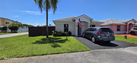 Photo of 18516 NW 56th Ave, Miami Gardens, FL 33055 (MLS # A12011043)