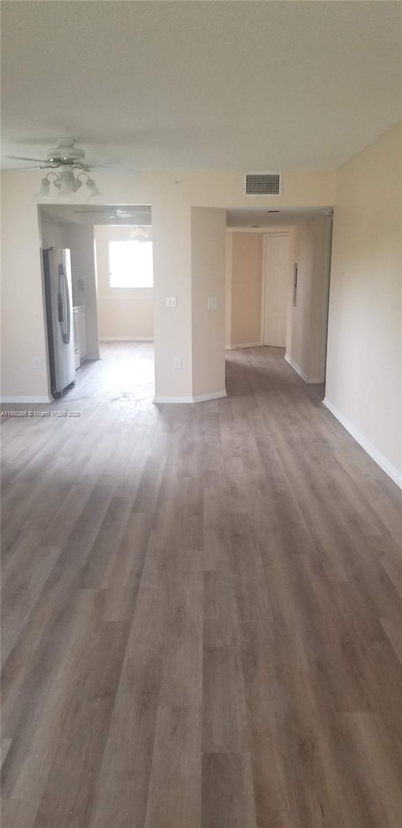 Lovely unit with laminate flooring, eat in kitchen area, washer and dryer in unit. Unit is the largest model, 1461 sq feet. Corner unit, according hurricane windows, lots of light and nice garden view. One assigned parking spot and lots of guest parking. Unit is currently rented with lease completed November 30th, 2025. Unit can be rented again with no restrictions. Tenant would like to continue leasing. She has been a good and timely paid tenant for 3 years. Current lease is $2,100 a month. Great for investors. Tenant agrees to show with an appointment. Call agent with questions.
Century Village is a 55+ community and at least one person on the deed must be 55 years or older.