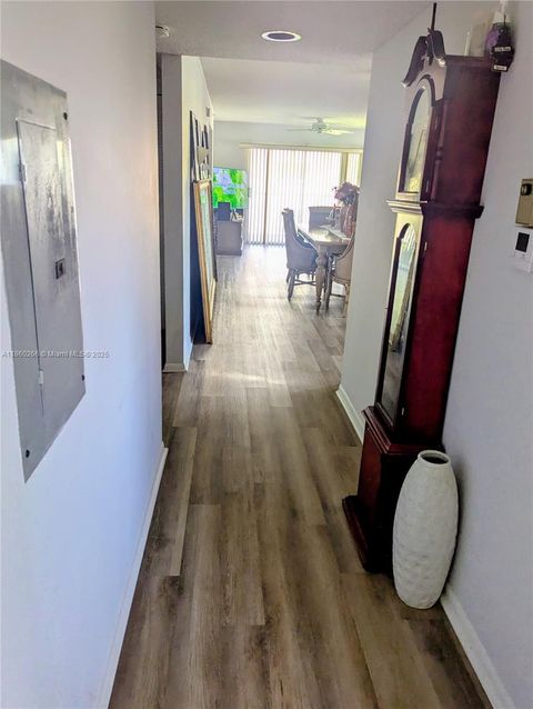 Photo of 1650 SW 124th Ter #212D, Pembroke Pines, FL 33027 (MLS # A11860266)
