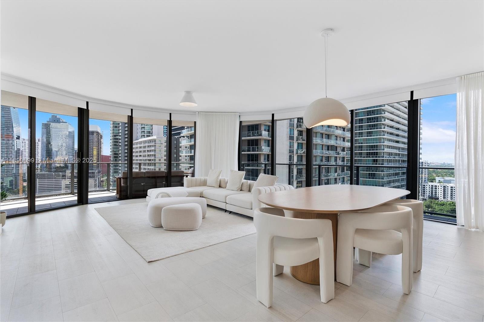 Meticulously designed to the last detail, this fully furnished home features exquisite designer décor, a custom Snaidero kitchen, and top-of-the-line Miele appliances, creating a seamless blend of elegance and functionality within Miami’s most iconic architectural landmark.
Boasting the largest floor plan available for tower residences, this exceptional 3-bedroom, 3.5-bath residence is wrapped in floor-to-ceiling windows and elliptical glass balconies, offering dramatic panoramic city views from every room.
Residents enjoy access to an exclusive 64th-floor rooftop deck, world-class spa, state-of-the-art fitness center, and resort-style pool. Nestled in the heart of Brickell, steps from Mary Brickell Village and Brickell City Centre, this home embodies elevated living at its finest.
