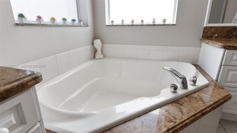 Tiny photo for 12300 NW 77th Mnr, Parkland, FL 33076 (MLS # A12008507)