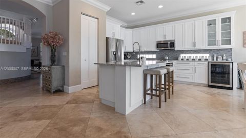 Tiny photo for 12300 NW 77th Mnr, Parkland, FL 33076 (MLS # A12008507)