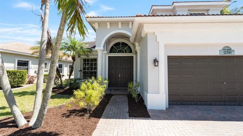 Tiny photo for 12300 NW 77th Mnr, Parkland, FL 33076 (MLS # A12008507)