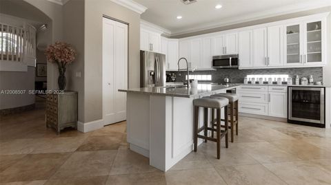 Tiny photo for 12300 NW 77th Mnr, Parkland, FL 33076 (MLS # A12008507)