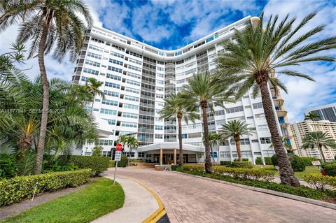 Photo of 100 Golden Isles Dr #104, Hallandale Beach, FL 33009 (MLS # A11977941)