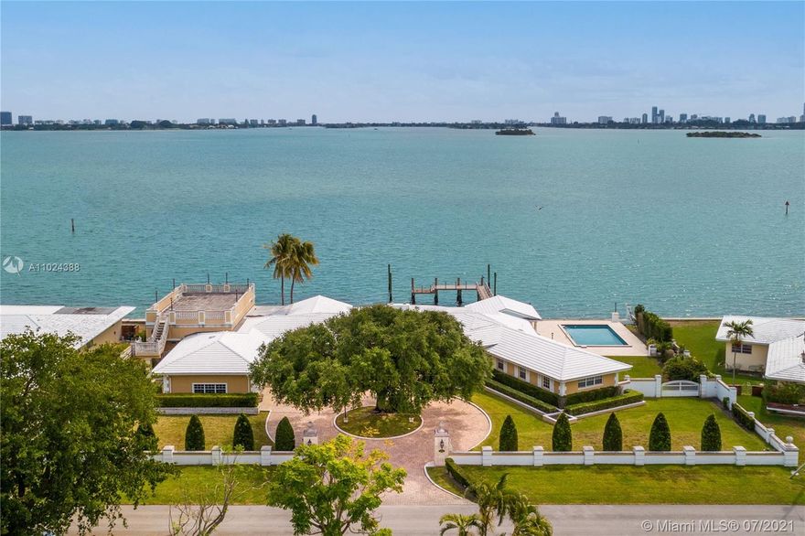 The most spectacular and best priced bayfront property in Miami! Double lot in beautiful Miami Shores with 28,047-sf of land, 187-feet of wide bayfront, and an oversized pier dock! The perfect development opportunity for investors/developers to build 2 new bayfront homes (each with 14,000-SF land and 93-FT of on the water) or 1 custom mega-mansion with 187-ft on the bay! The current home on the property is a single-story home with 5 beds, 4.5 baths, large living/Florida room, high ceilings, a rooftop deck, with great potential to update and modernize. Perfectly manicured property with circular driveway, 2-car garage, and a large pool.