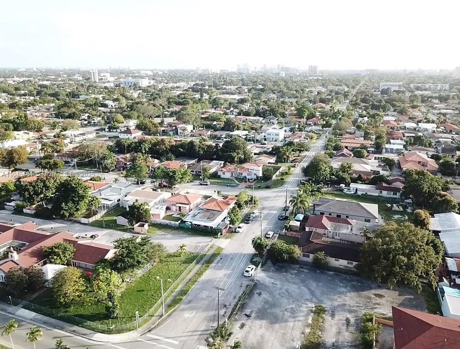 Great vacant prime corner lot on SW 35th Ave. Nice opportunity of 0.33 acres / 14,521 Sq. Ft. for commercial use. Lot next door also for sale which covers a whole street block on Flagler St. with excellent retail / commercial potential. Close to shopping, restaurants and parks. Can be sold separately or together.