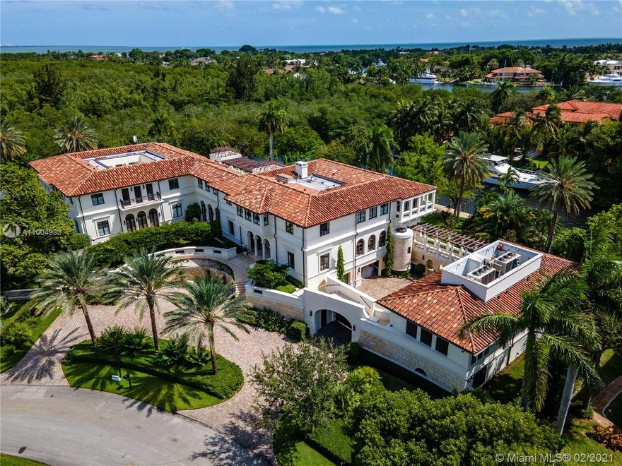 One of a kind opportunity lo live in this impressive modern Mediterranean estate! Villa Costanera is located in exclusive Islands of Cocoplum, this masterpiece was designed by Rafael Portoundo and sits on a corner lot with 1.3 acres for maximum privacy and over 480ft of water frontage. Offering 20,546 sf of living space, this home features exceptional craftsmanship with designer interior finishes, commercial elevator, 3 kitchens, separate staff/guest quarters, expansive terraces + more. Situated on Coral Gables waterway with direct access to Biscayne bay.