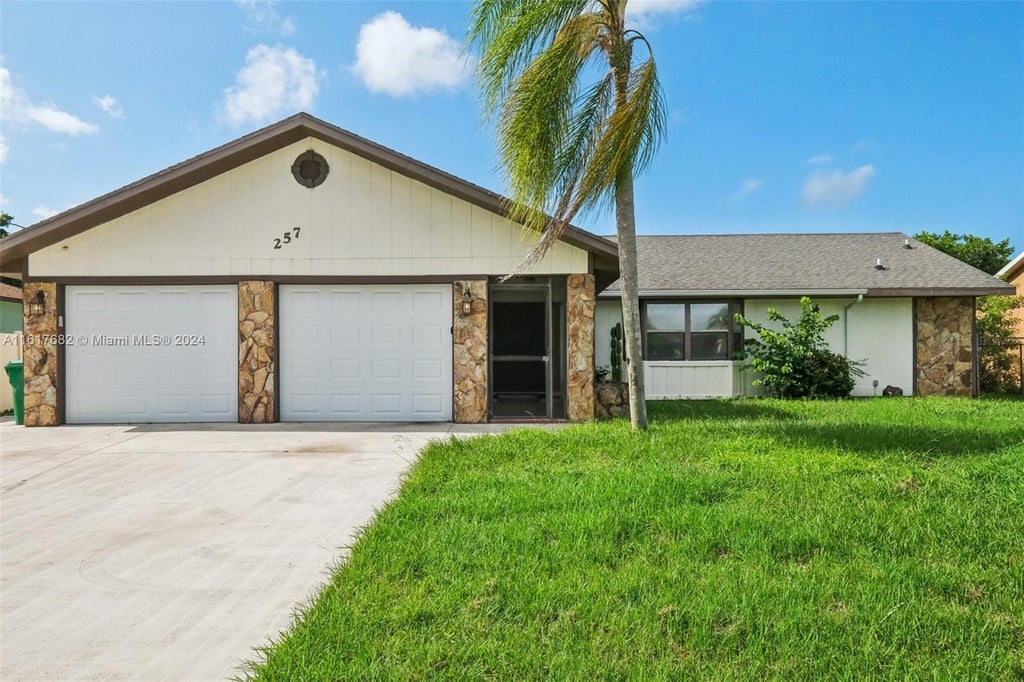 Photo of 257 SW Whitmore Dr, Port Saint Lucie, FL 34984 (MLS # A11617682)