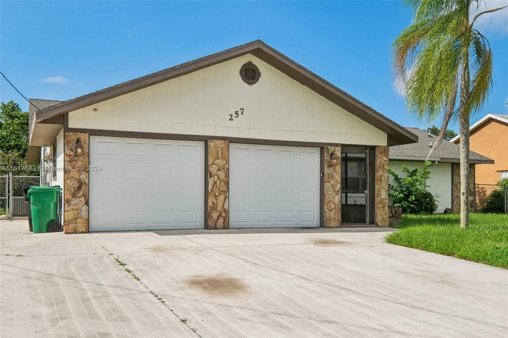 Photo of 257 SW Whitmore Dr, Port Saint Lucie, FL 34984 (MLS # A11617682)