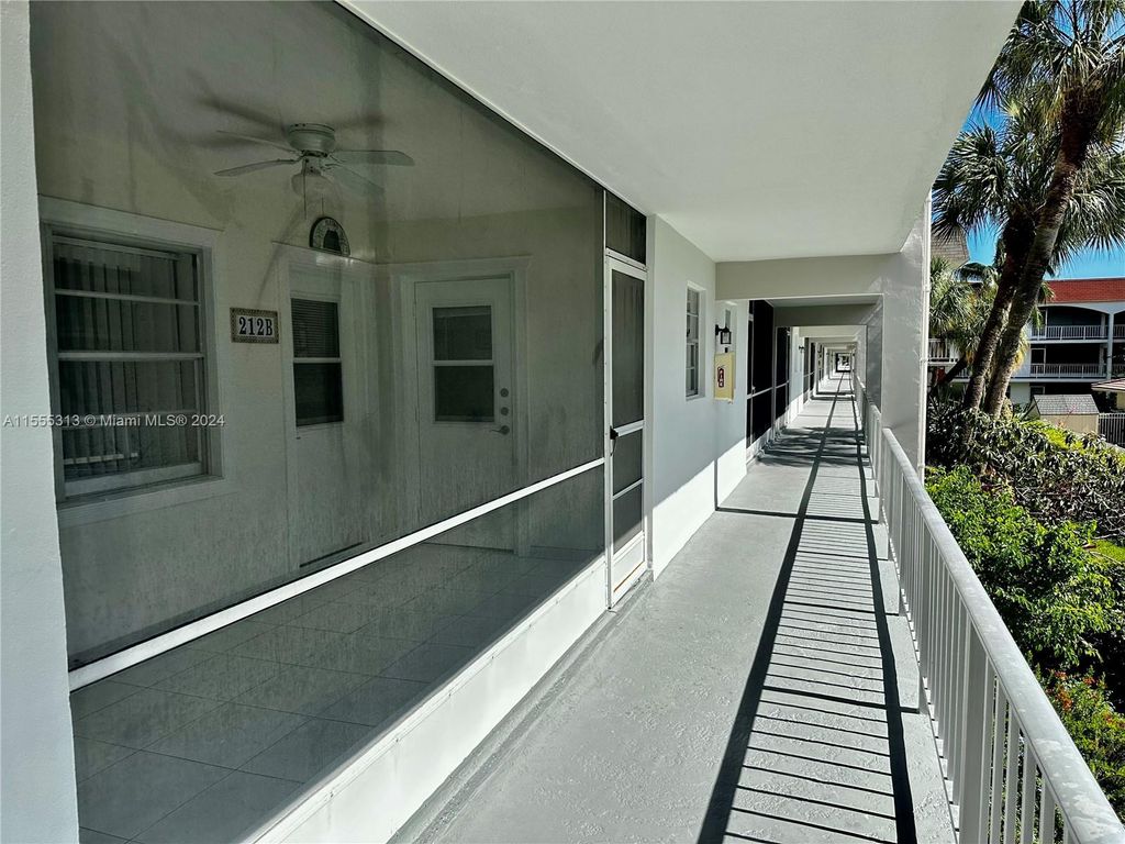 Photo of 581 Blue Heron Dr #212-B, Hallandale Beach, FL 33009 (MLS # A11555313)